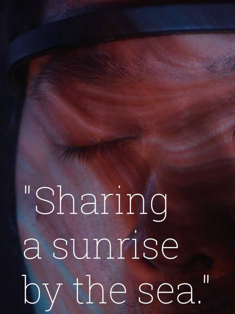 Participant with eyes closed, overlaid with the memory 'Sharing a sunrise by the sea'