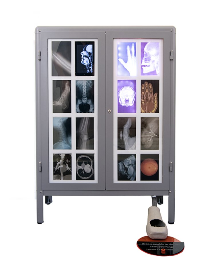 The Long Run: interactive marble-run cabinet built from hospital equipment