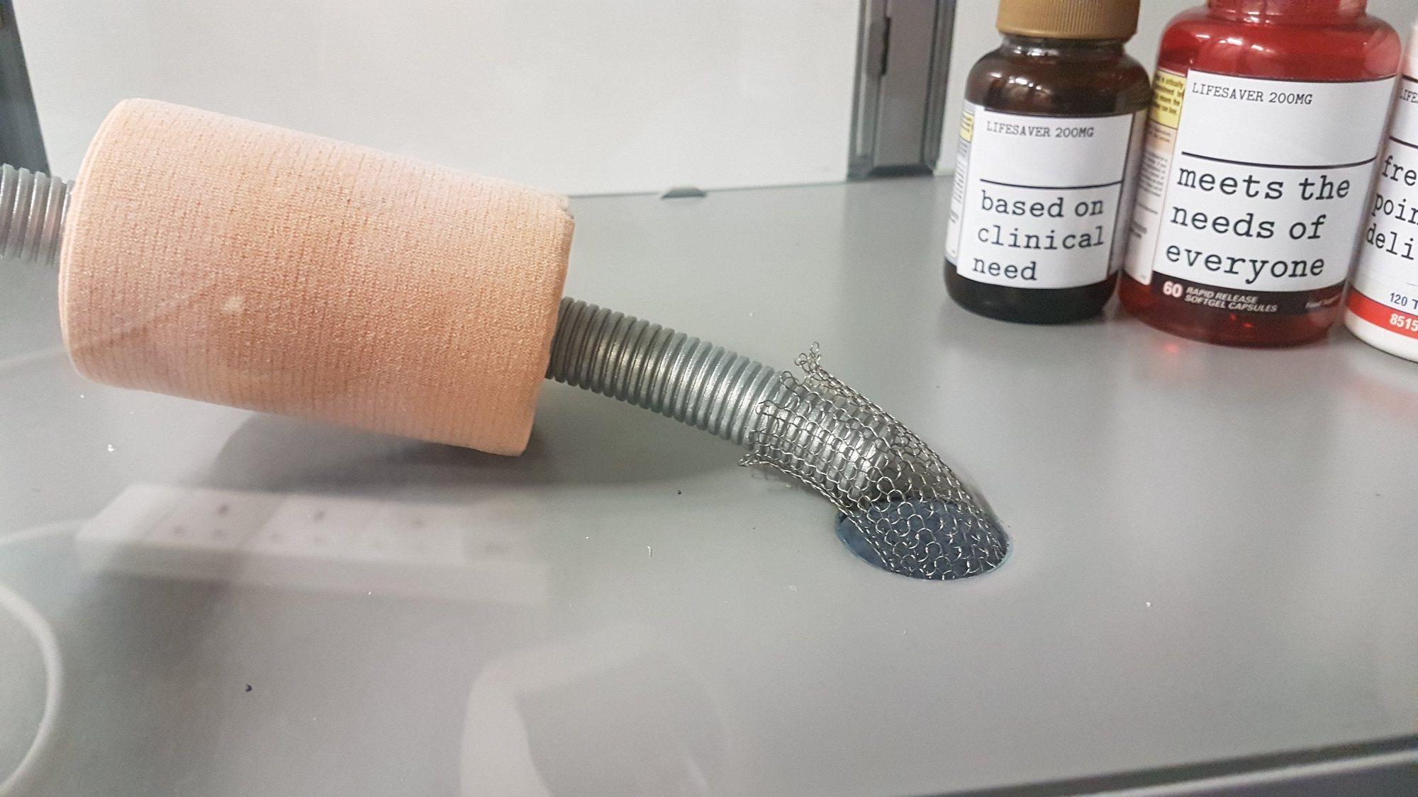 Bandage-wrapped tube used as part of a marble run